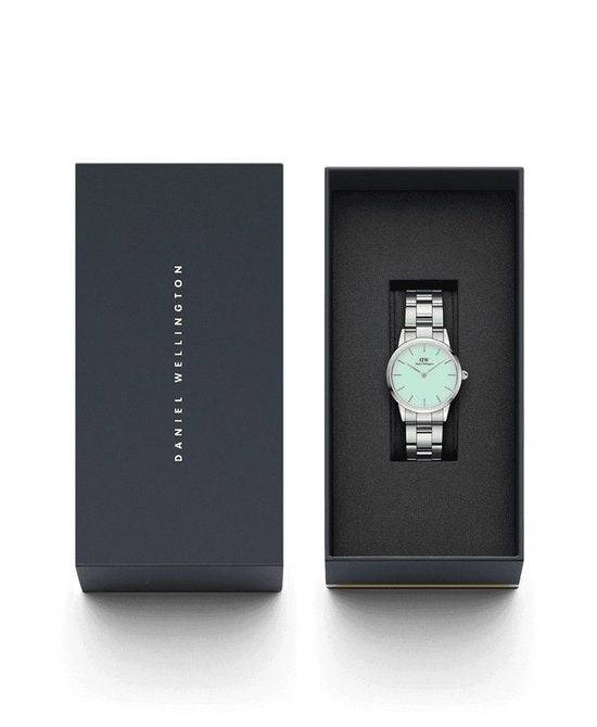 Daniel Wellington Iconic Link Capri 32mm horloge in luxe zwarte geschenkverpakking, elegant dameshorloge met zilveren schakelband en mintgroene wijzerplaat.