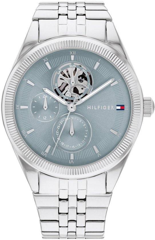 Tommy Hilfiger TH1782714 Monica dameshorloge 38mm met zilverkleurige schakelband en lichtblauwe wijzerplaat, stijlvol en duurzaam ontwerp.